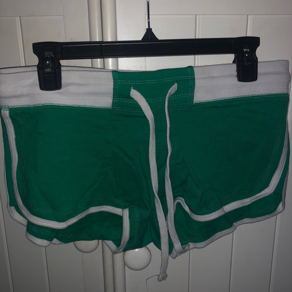 Green and white sweat shorts